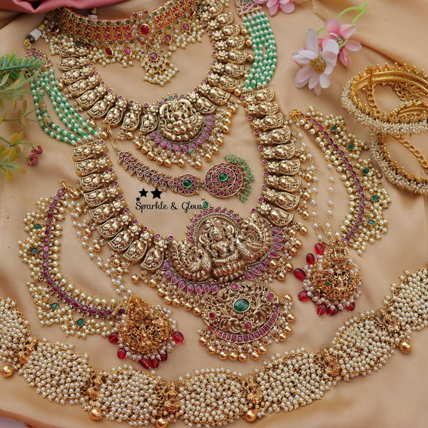 3 Neckless, 1 Pair Earring, 1 Maang Tikka, 1 Kamarband,2